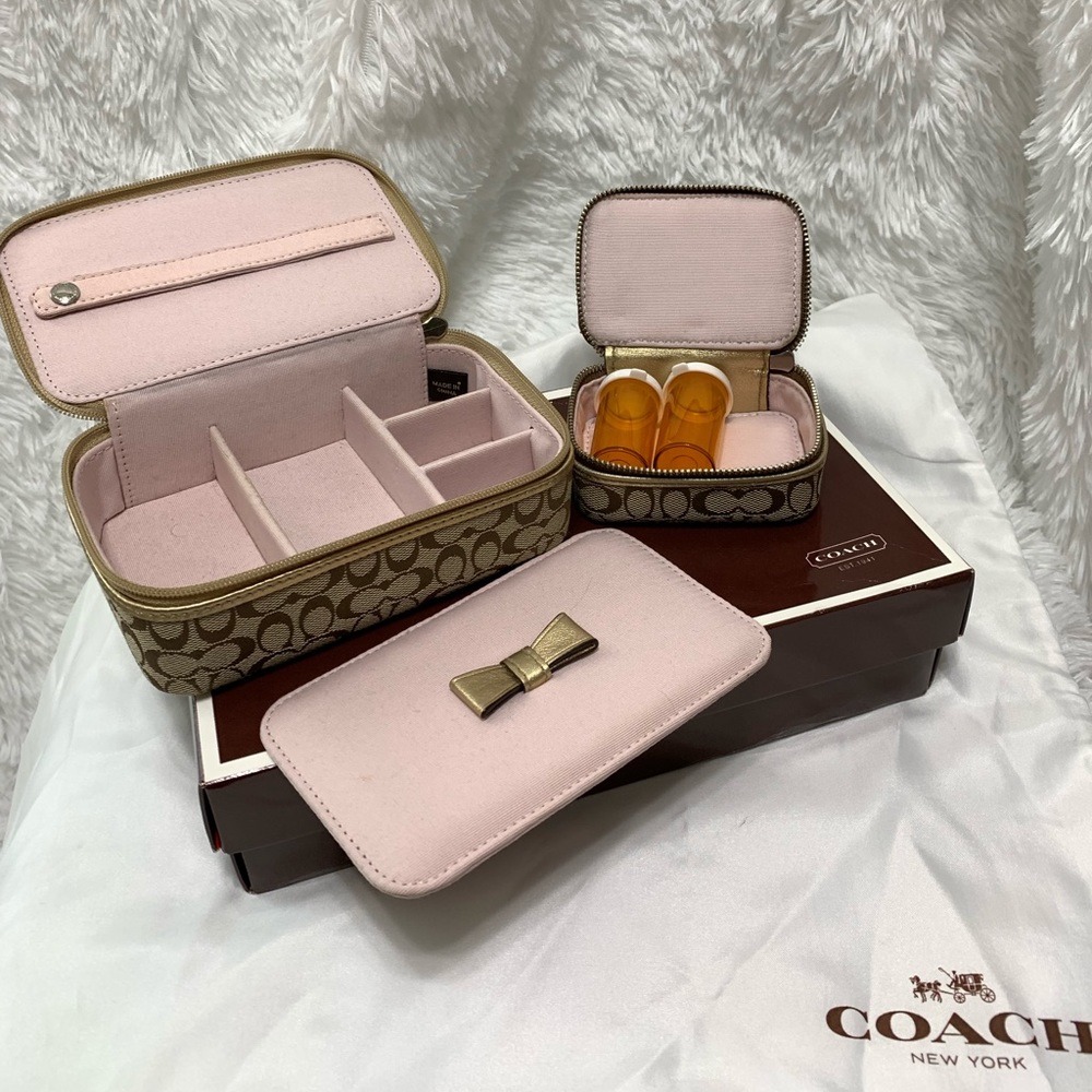 Coach®️ Brown and gold signature C travel boxes